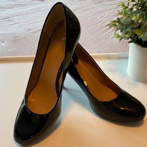 Patent leather almond toe pumps